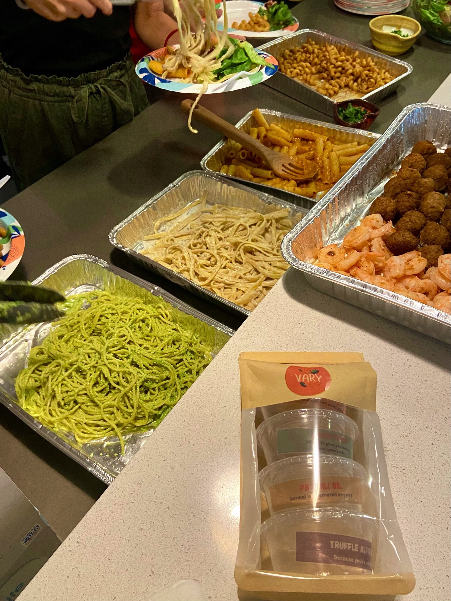 VARY tasting spread — pesto, vodka, alfredo and bolognese pastas